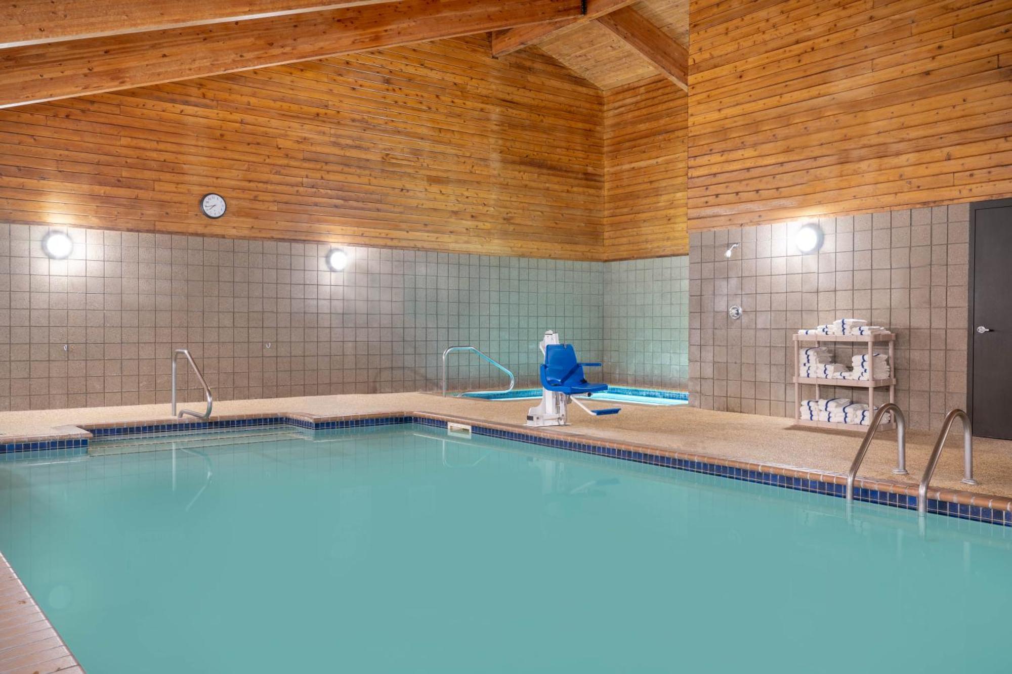 Aspen Hotel Rogers Formerly Americ Inn Esterno foto