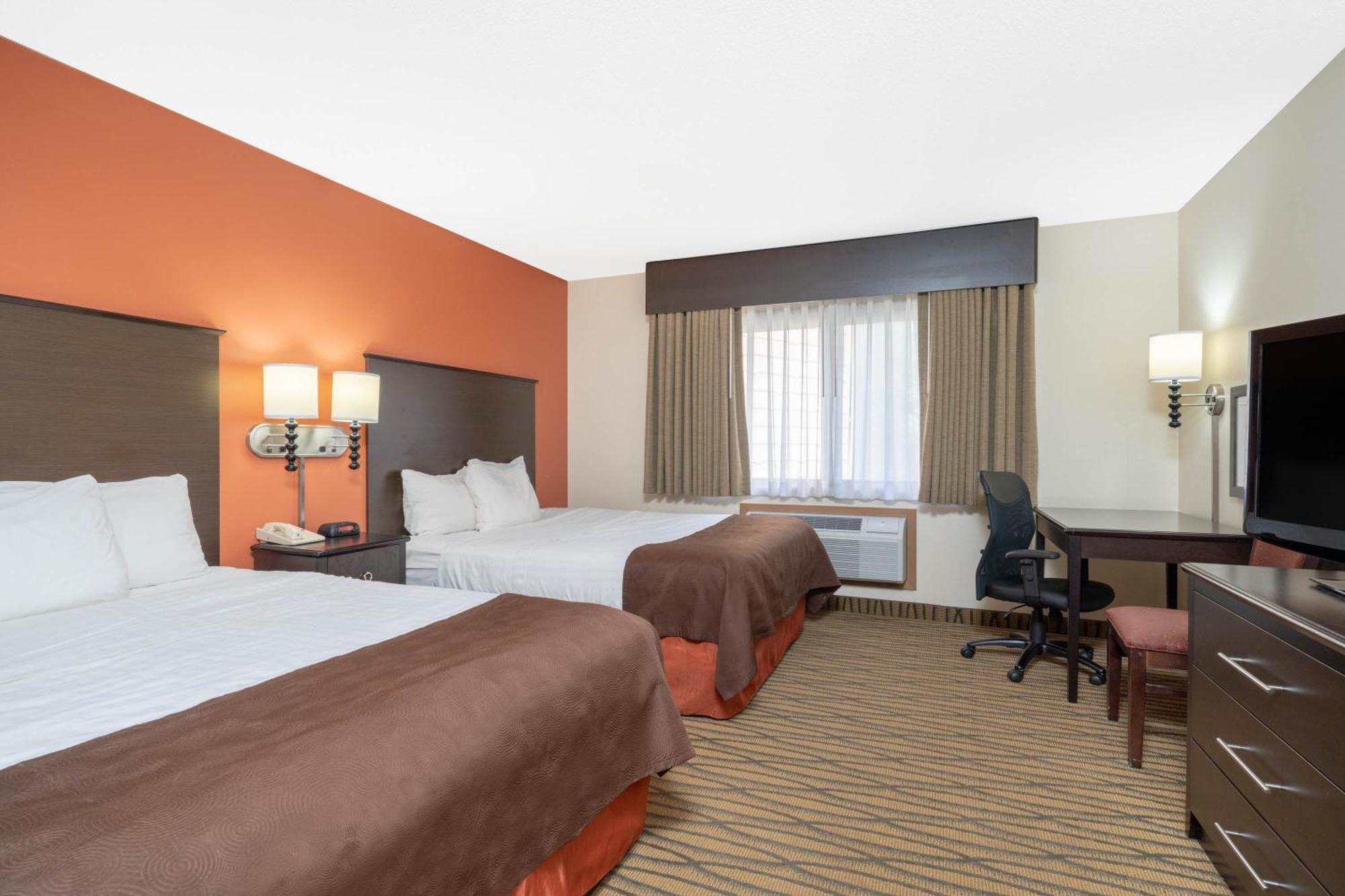 Aspen Hotel Rogers Formerly Americ Inn Esterno foto