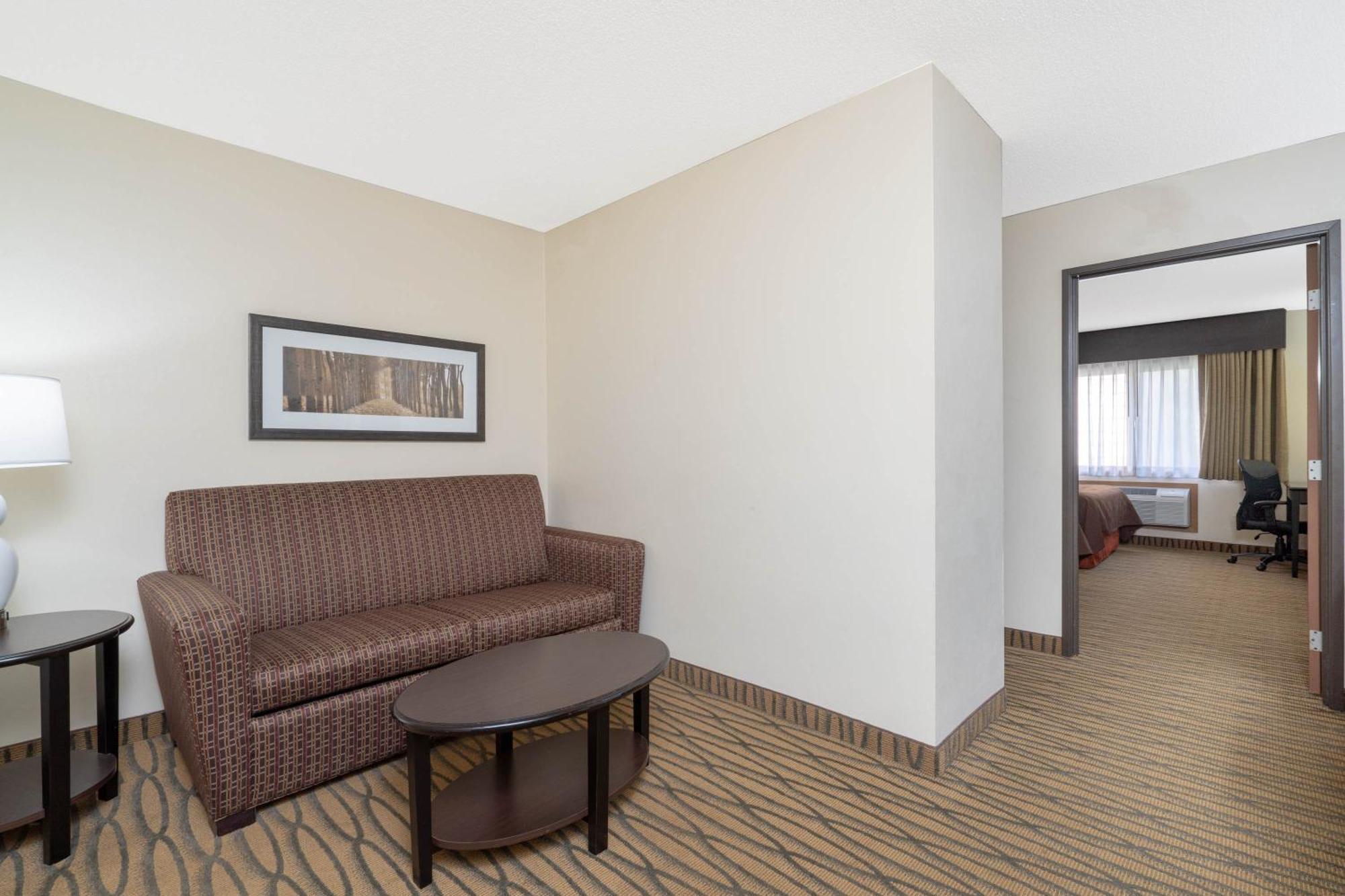 Aspen Hotel Rogers Formerly Americ Inn Esterno foto