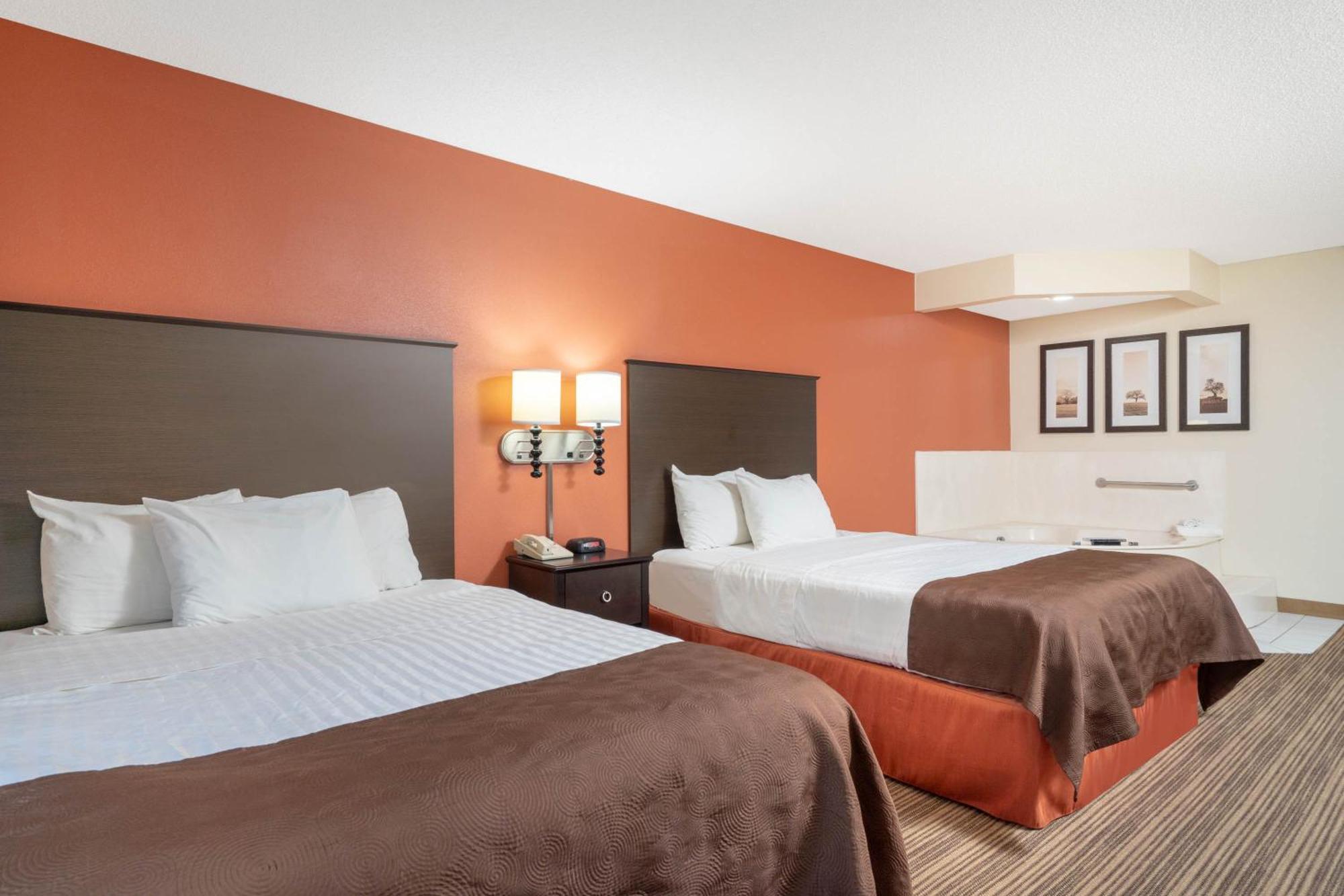 Aspen Hotel Rogers Formerly Americ Inn Esterno foto