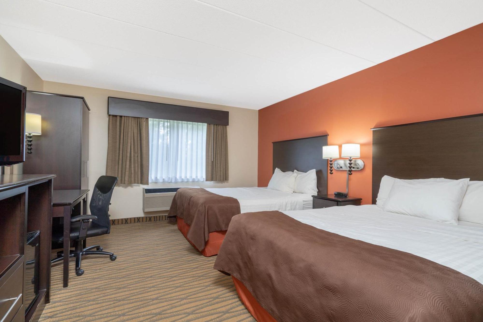 Aspen Hotel Rogers Formerly Americ Inn Esterno foto