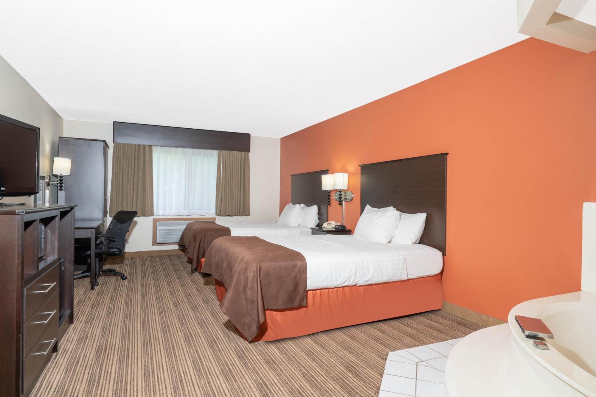 Aspen Hotel Rogers Formerly Americ Inn Esterno foto