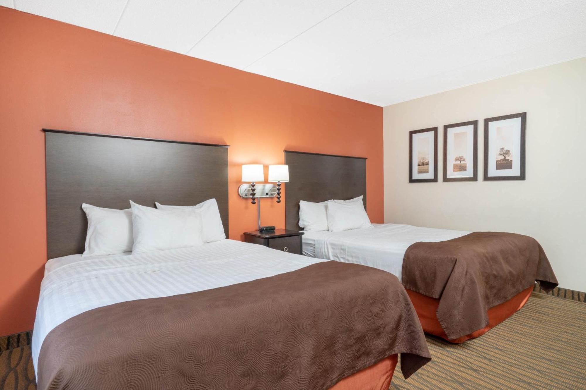 Aspen Hotel Rogers Formerly Americ Inn Esterno foto
